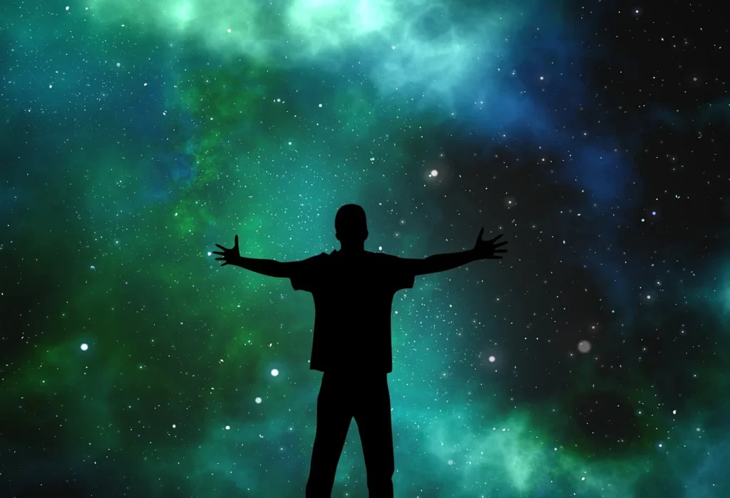 Man manifesting under night sky with bright light