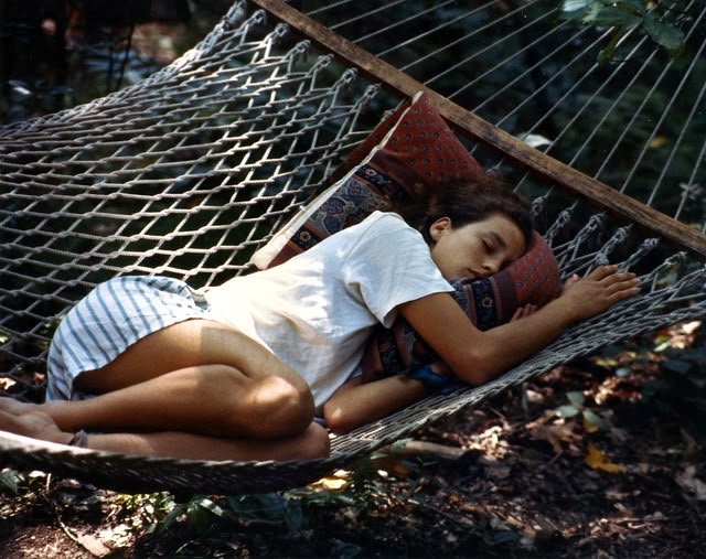 how to set rest relax goals - woman sleeping on hammock