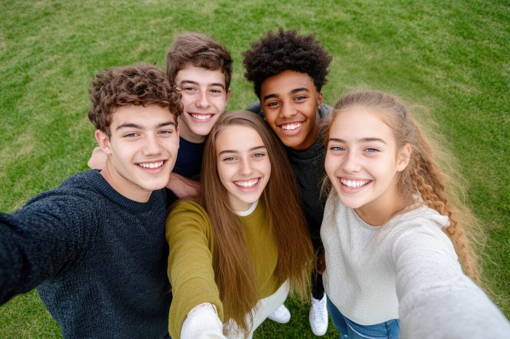 Friends laughing together while chatting on questions to ask a friend