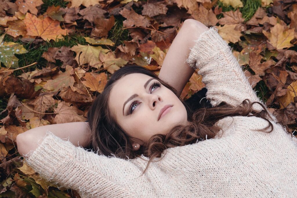 how to set rest relax goals - woman lying on the ground