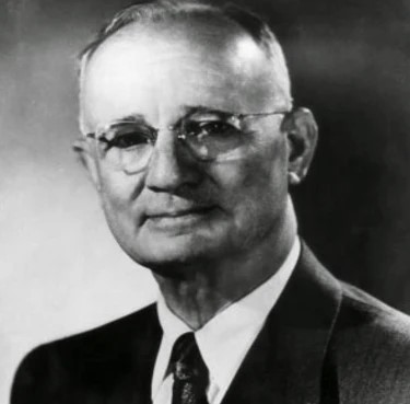 Close-up of Napoleon Hill's face, conveying his vision and determination